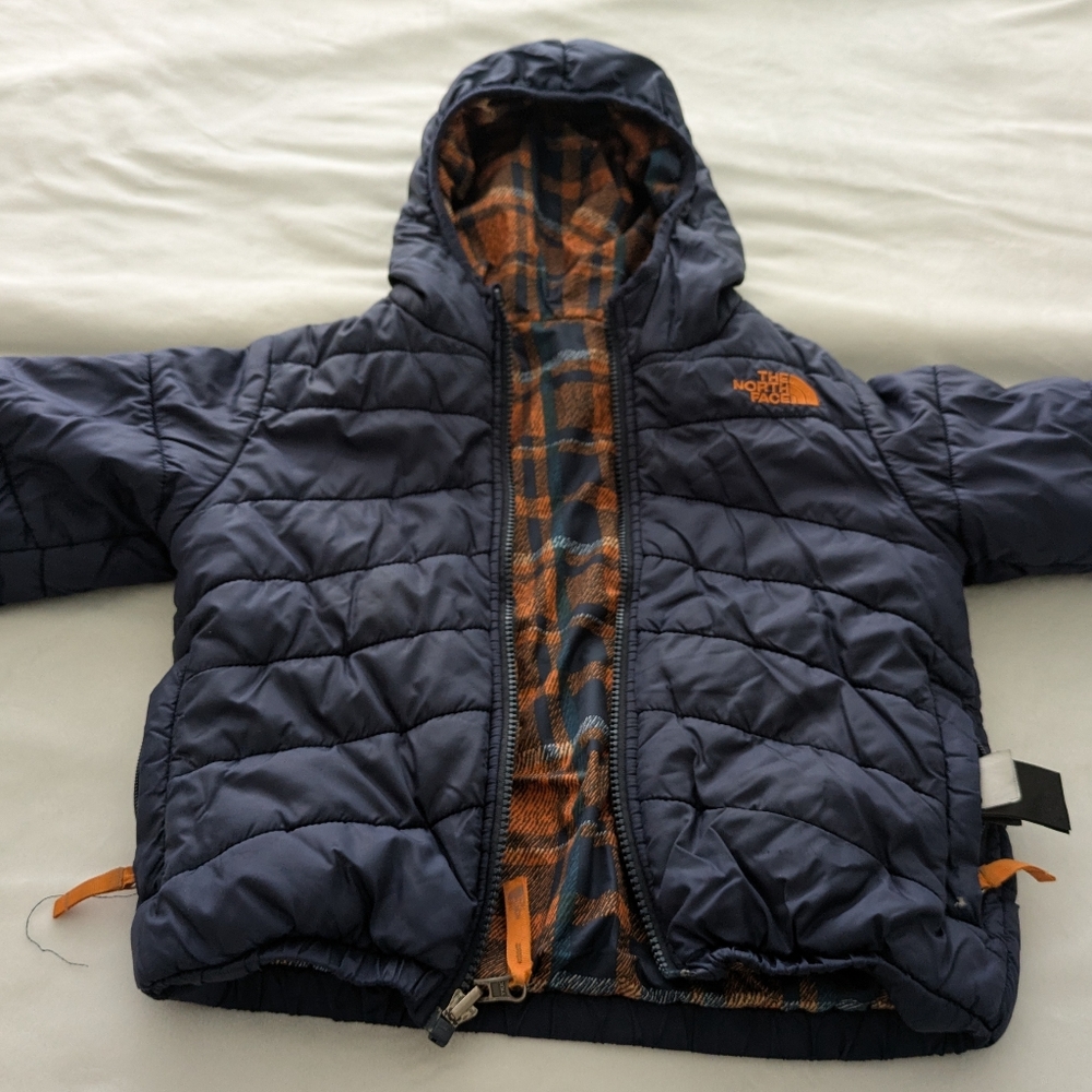 The North Face Dark Blue and Orange Quilted Jacket